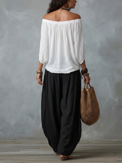 LUCILLA – Completo Bohémien con Blusa Off-Shoulder e Pantalone a Lanterna